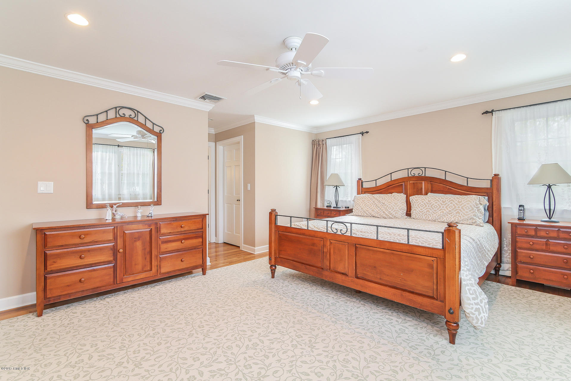 22 Griffith Road Riverside, CT 06878 - Photo 21 of 40 a bedroom with a bed and a dresser