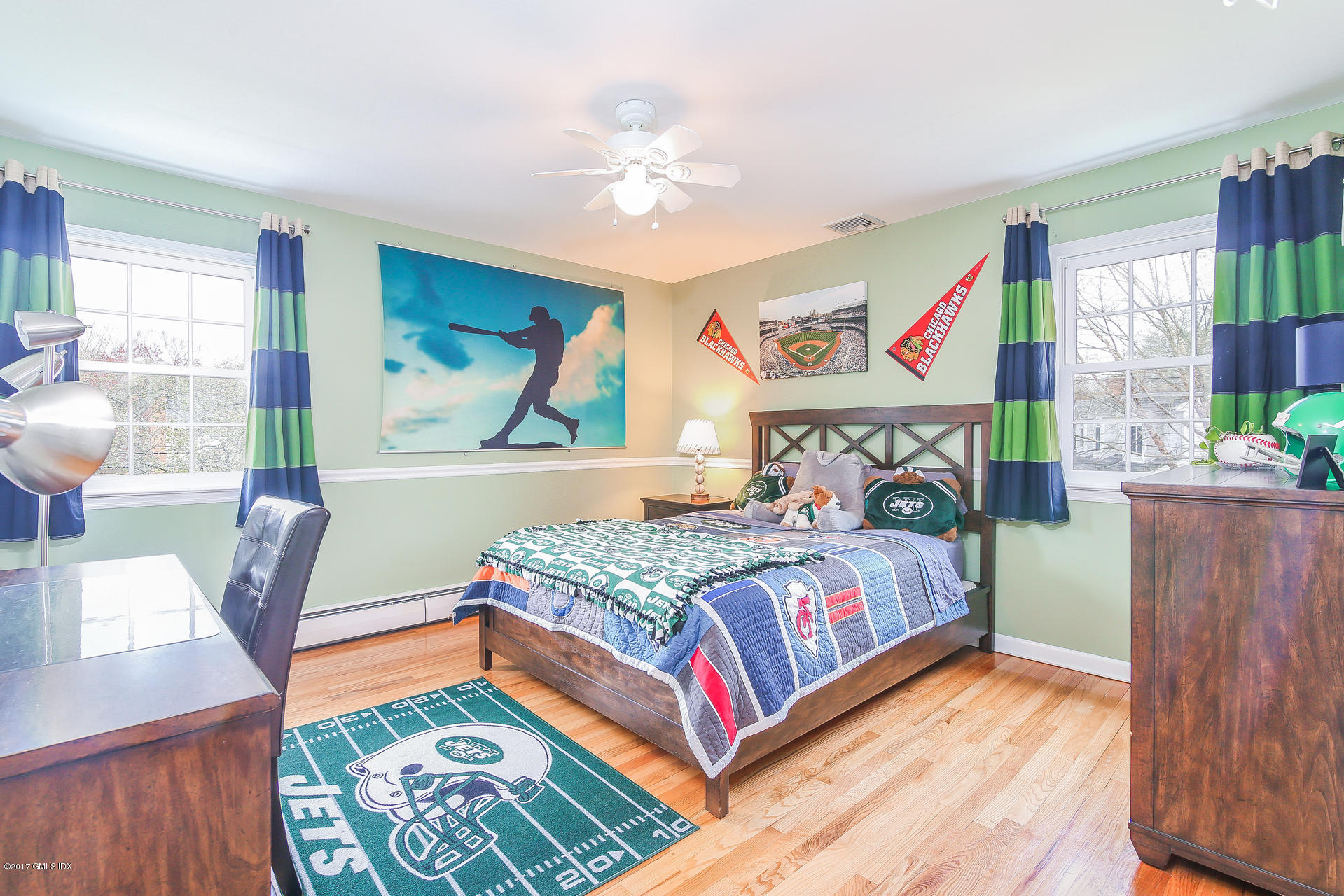 22 Griffith Road Riverside, CT 06878 - Photo 24 of 40 a bedroom with a bed and a table in it