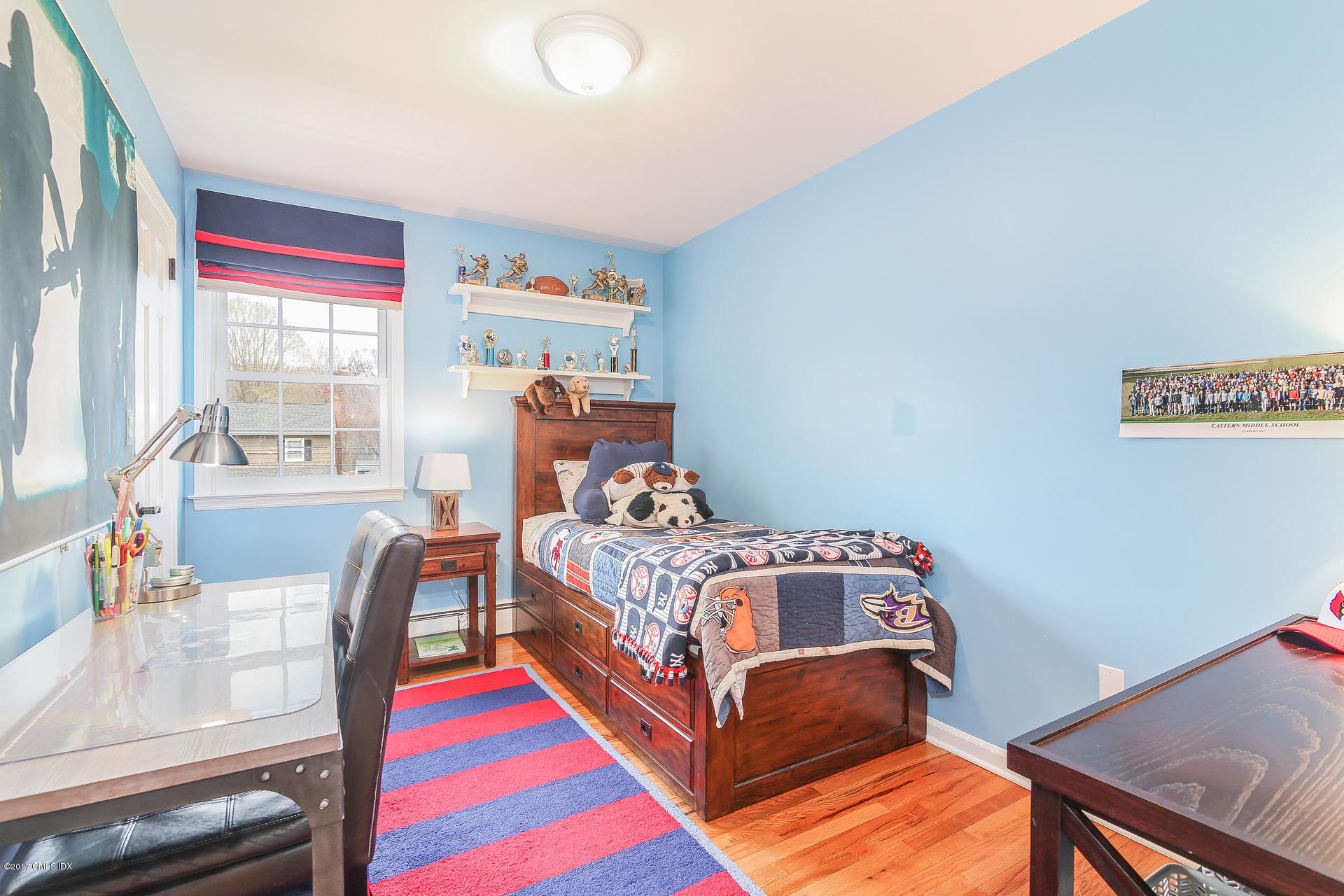 22 Griffith Road Riverside, CT 06878 - Photo 26 of 40 a bed room with a bed and a chair