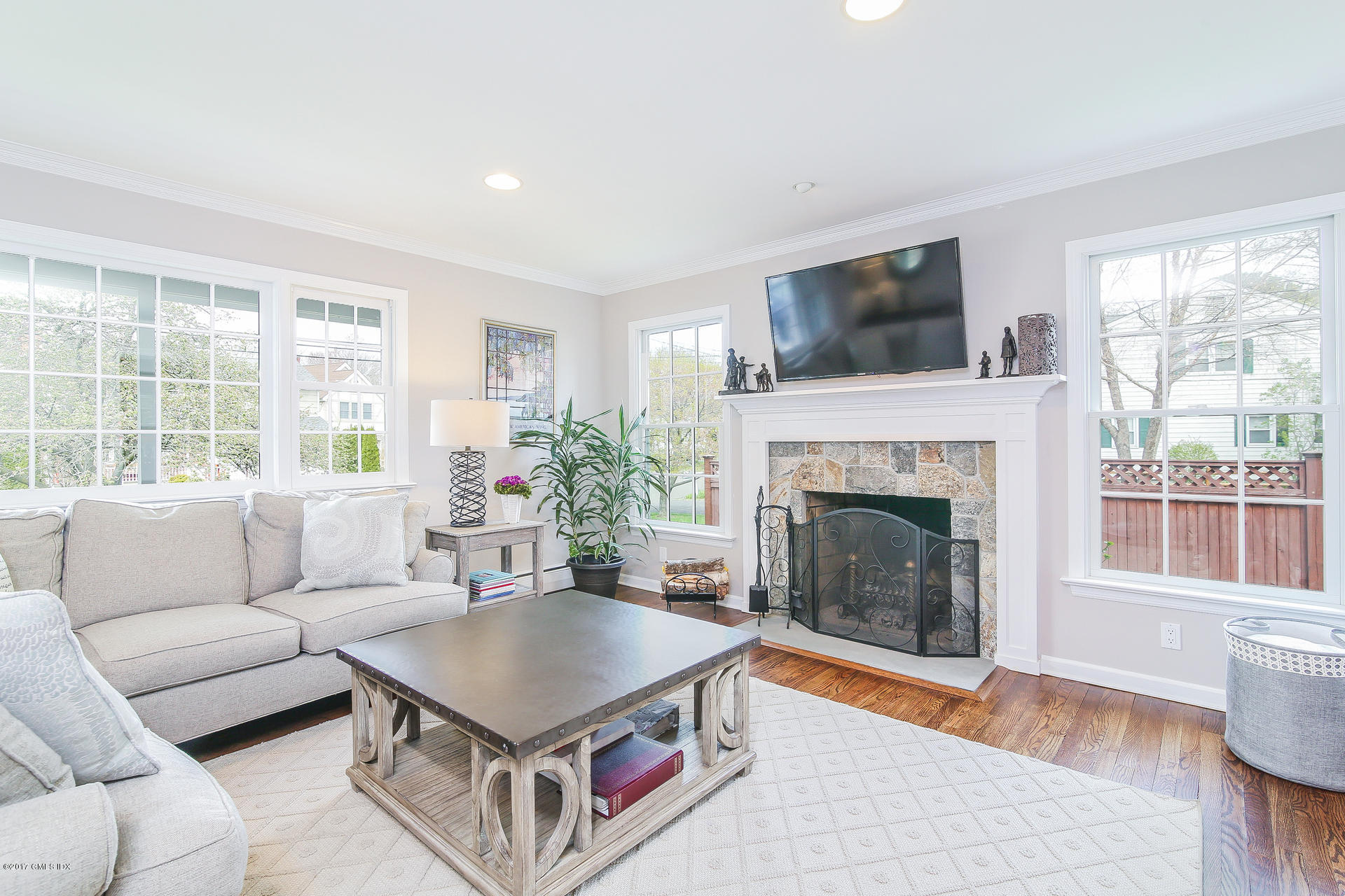 22 Griffith Road Riverside, CT 06878 - Photo 6 of 40 a living room with furniture and a fireplace