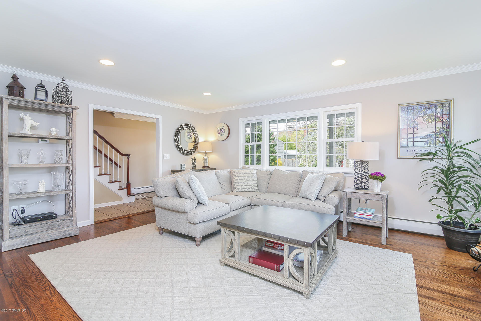 22 Griffith Road Riverside, CT 06878 - Photo 7 of 40 a living room with furniture and a large window