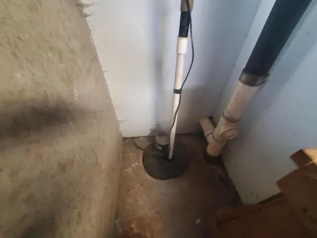 a view of a bathroom with a sink and mirror