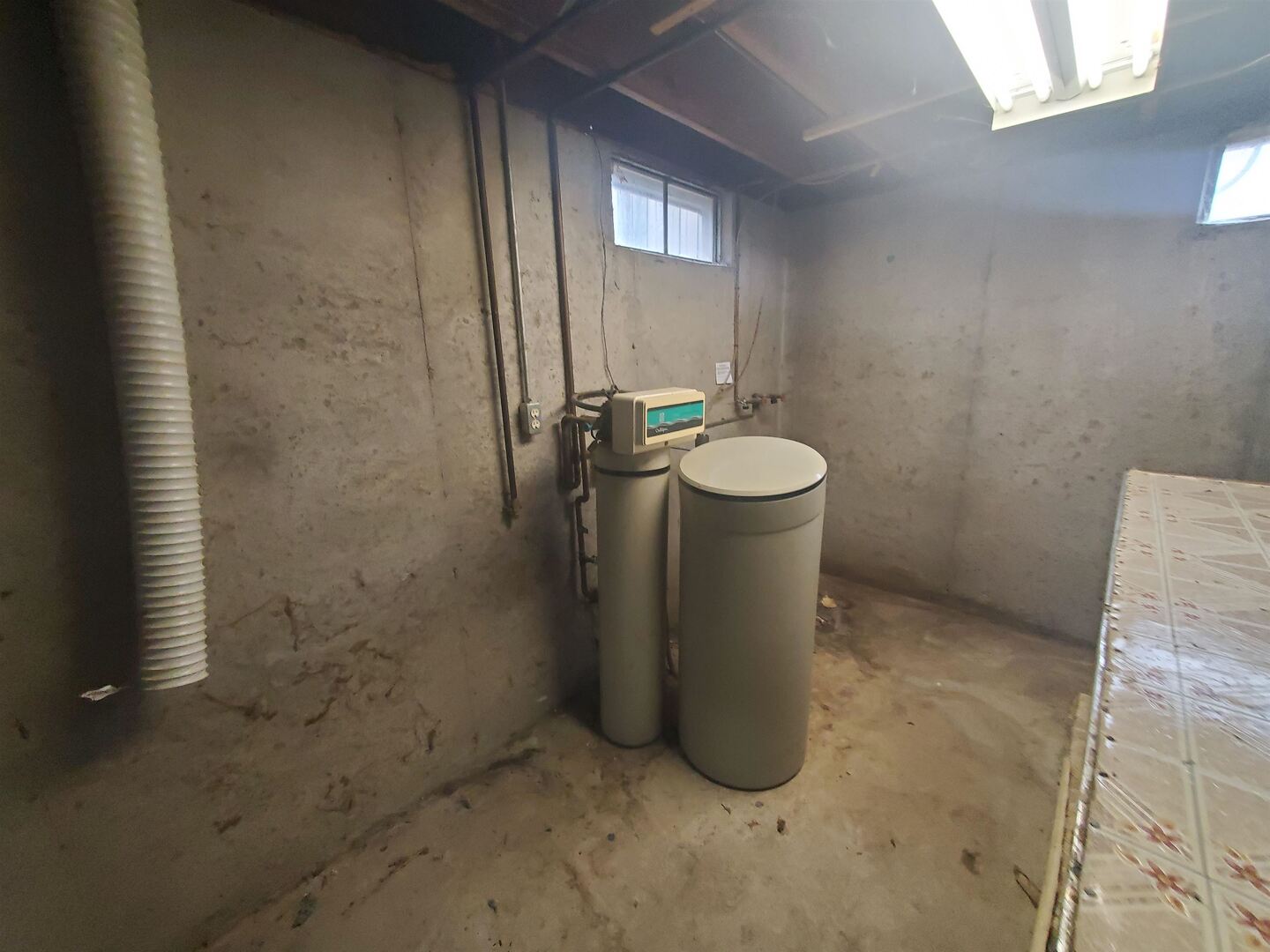 3305 3rd St A East Moline, IL 61244 - Photo 12 of 12 a view of a bathroom with a sink and mirror