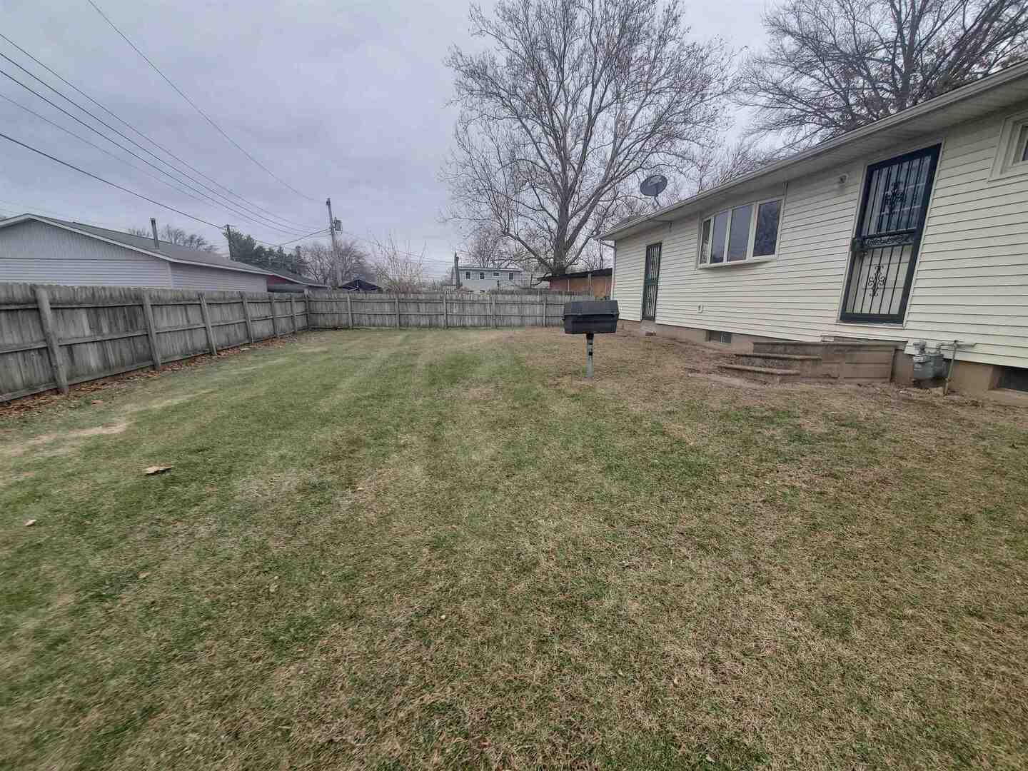 3305 3rd St A East Moline, IL 61244 - Photo 3 of 12 a view of a backyard of the house