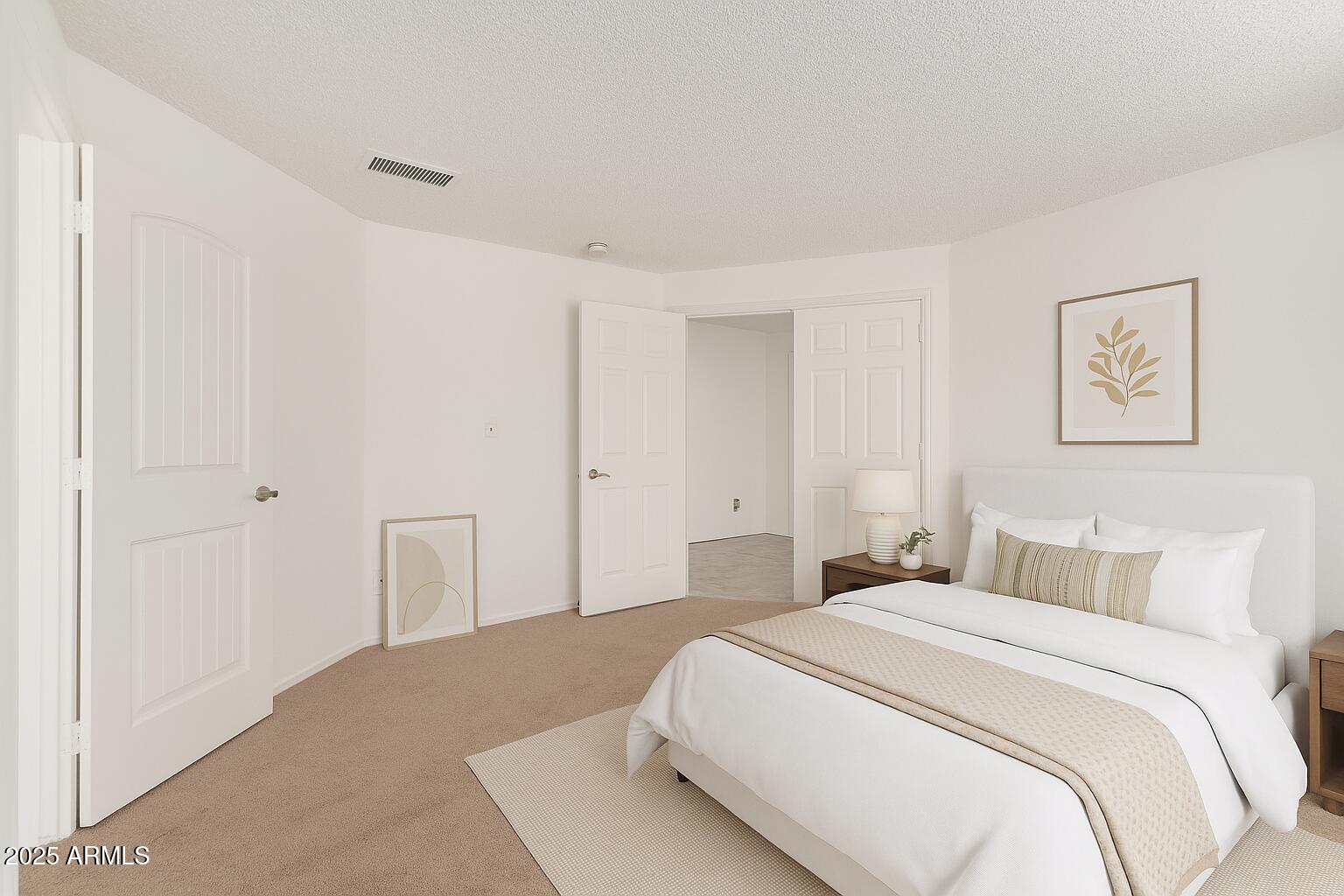 3419 North 70th Avenue Phoenix, AZ 85033 - Photo 17 of 31 a bedroom with a bed and painting on the wall