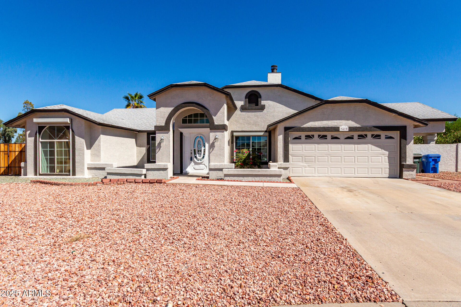 3419 North 70th Avenue Phoenix, AZ 85033 - Photo 2 of 31 a front view of a house with a yard