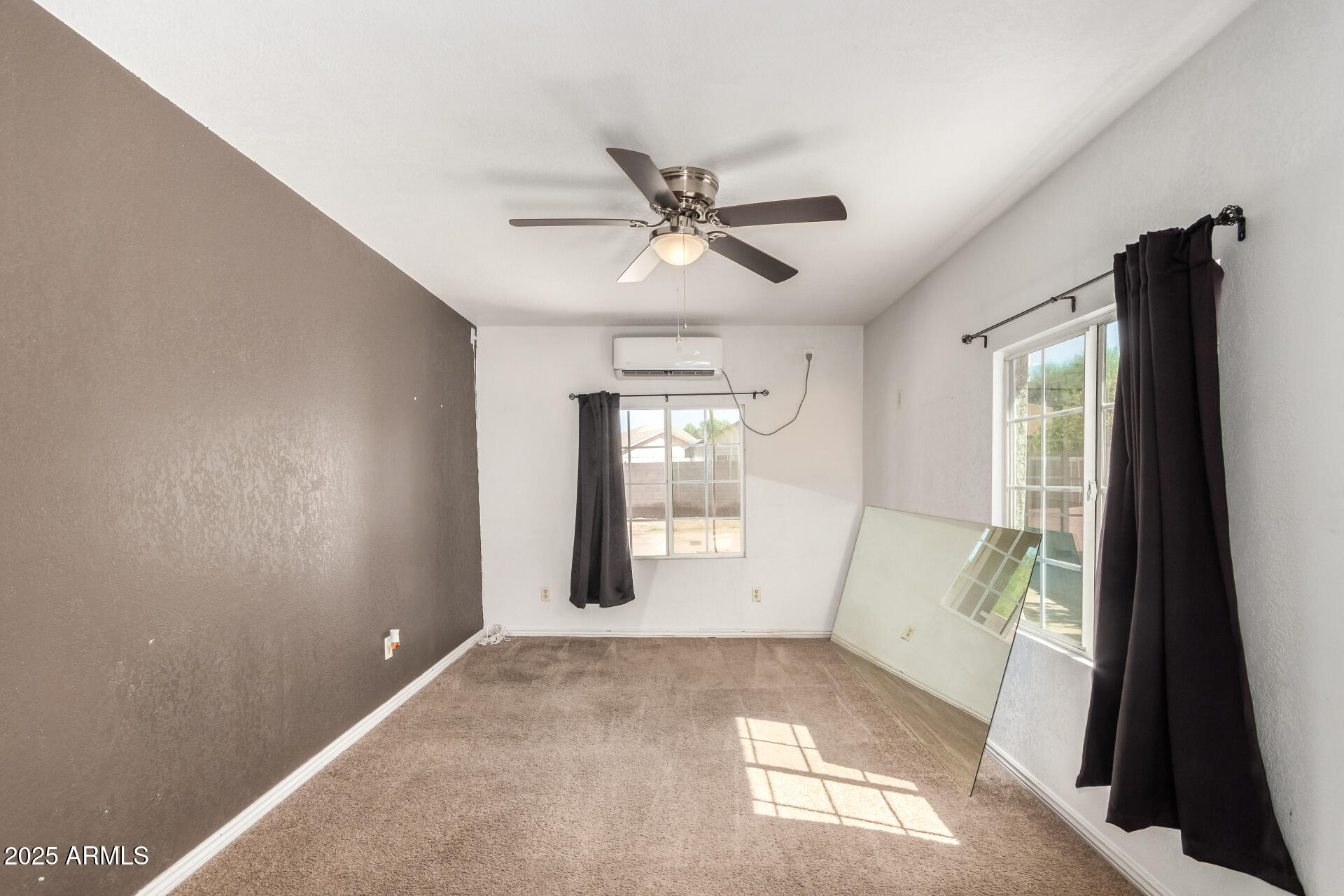 3419 North 70th Avenue Phoenix, AZ 85033 - Photo 22 of 31 a view of livingroom with window