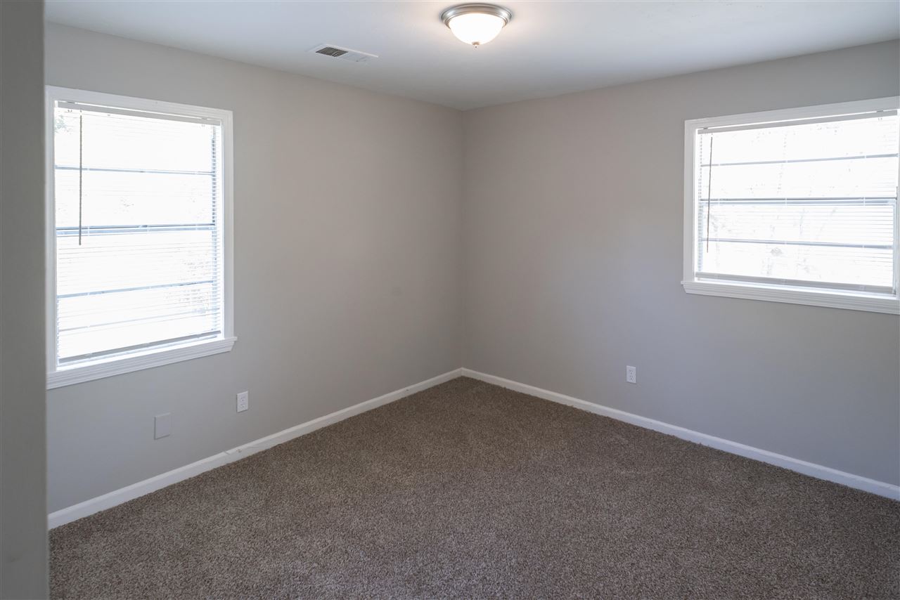 1494 Winfield Road Memphis, TN 38116 - Photo 13 of 20 an empty room with a window