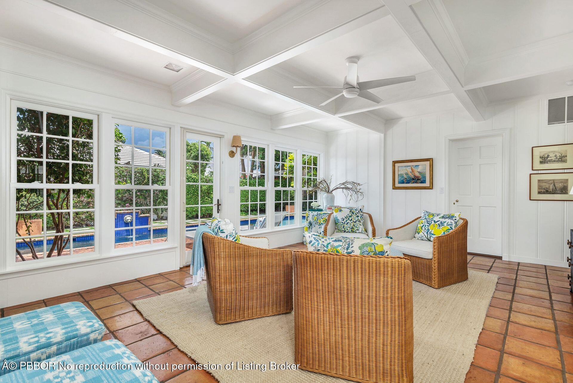 255 Colonial Lane Palm Beach, FL 33480 - Photo 8 of 32 a living room with furniture and a floor to ceiling window