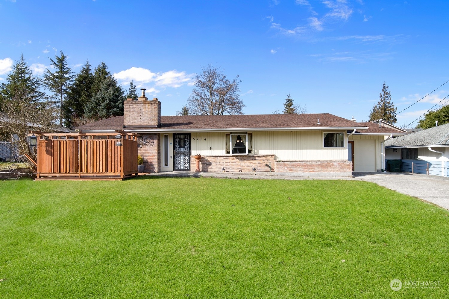 5214 West Highland Road Everett, WA 98203 - Photo 2 of 36 a front view of a house with yard porch and furniture