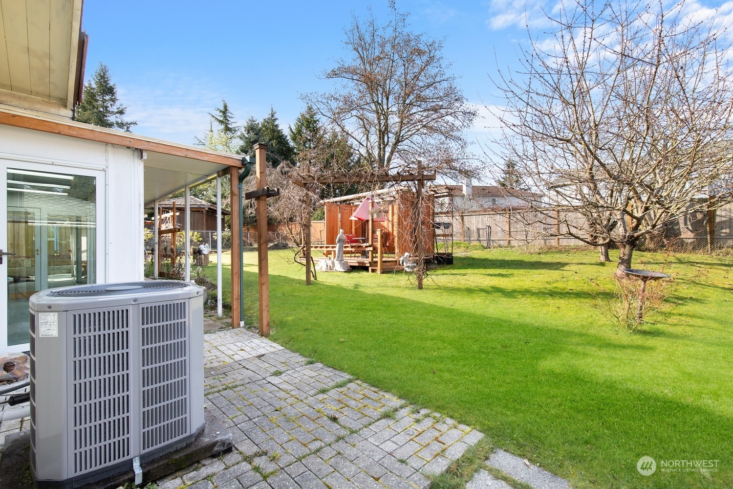 5214 West Highland Road Everett, WA 98203 - Photo 26 of 36 a view of a building with a yard