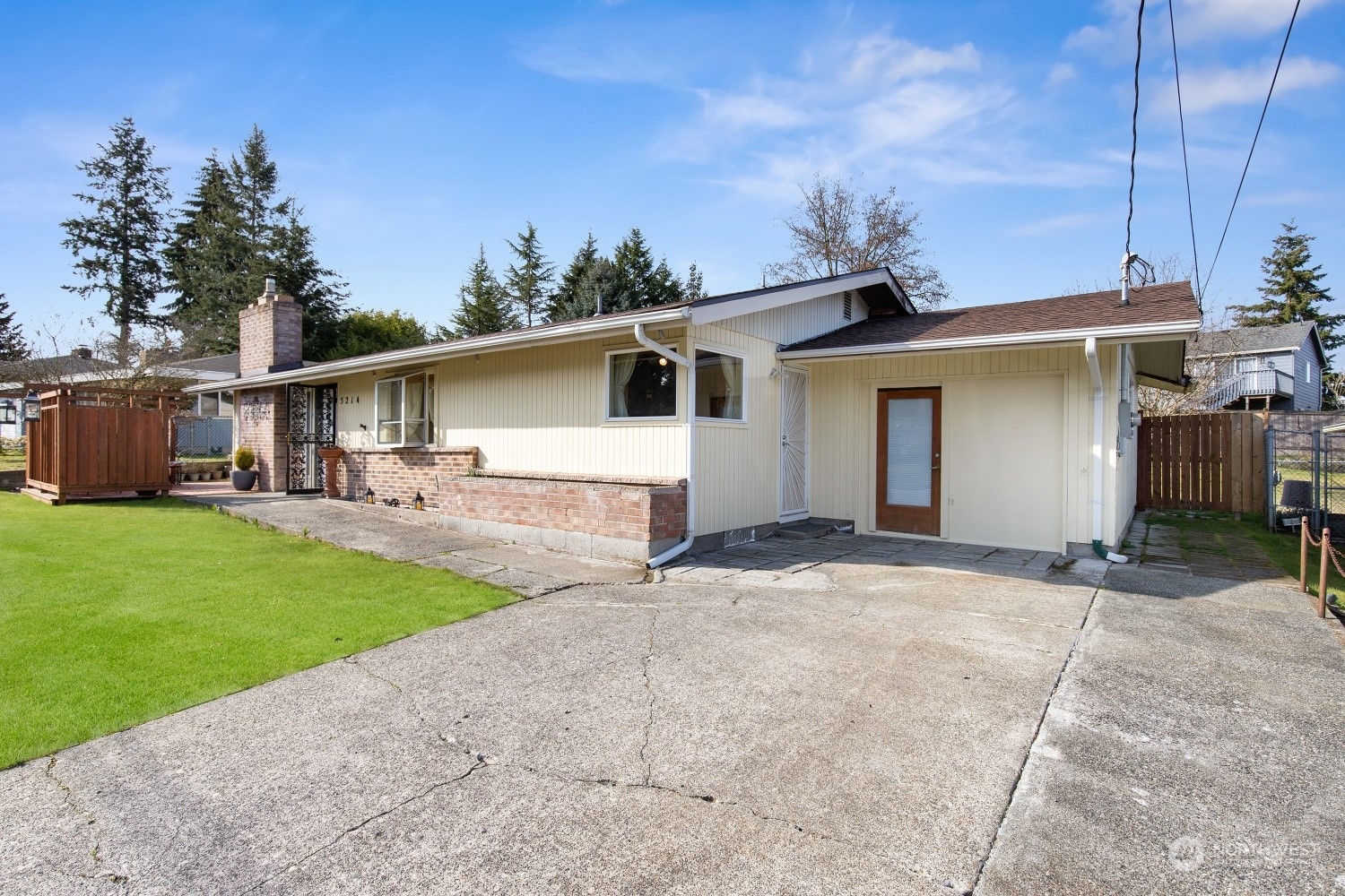 5214 West Highland Road Everett, WA 98203 - Photo 30 of 36 a view of a yard with a patio