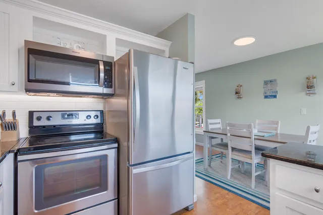 a bedroom with a bed and a television