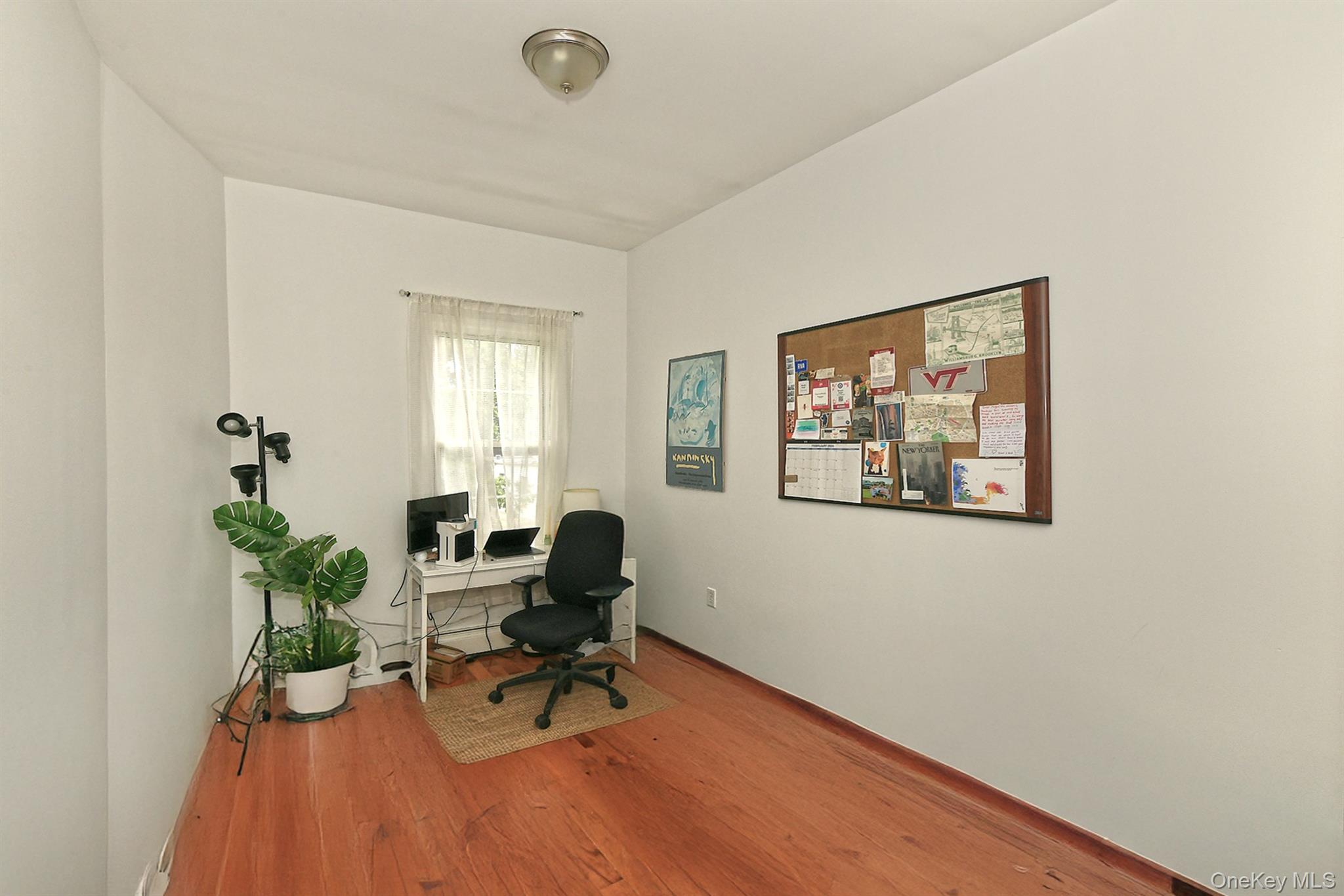 1244 Jefferson Avenue Brooklyn, NY 11221 - Photo 13 of 21 a view of a workspace with furniture and a window