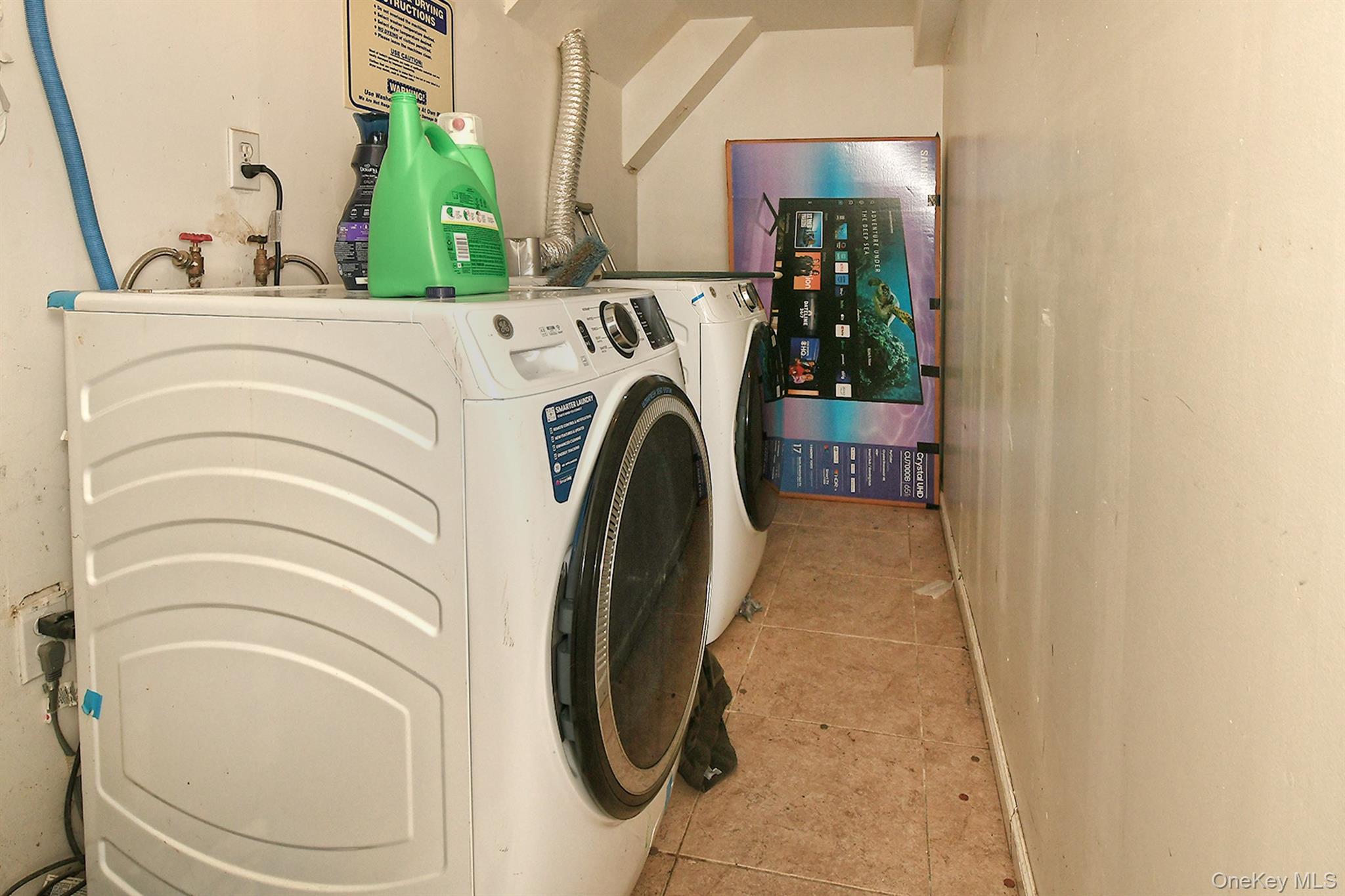 1244 Jefferson Avenue Brooklyn, NY 11221 - Photo 17 of 21 a utility room with dryer and washer