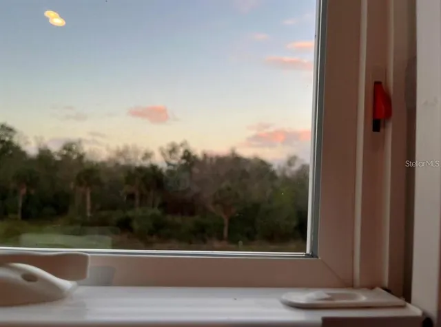 a view of backyard with workspace