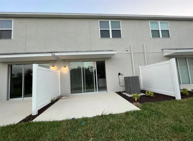 a view of swimming pool with a yard