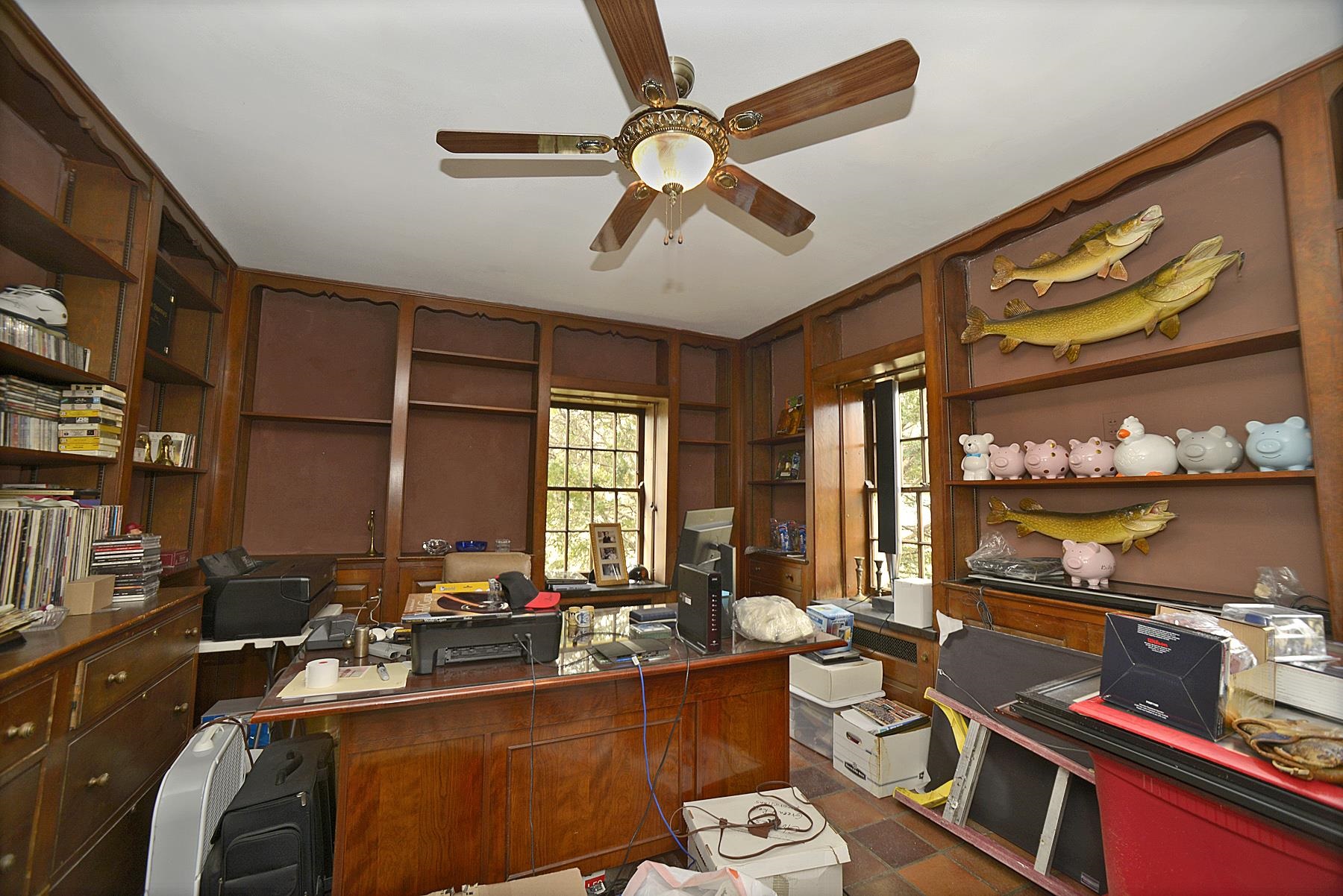 2221 Twin Oak Road Peru, IL 61354 - Photo 24 of 63 a room with lots of wooden furniture and windows