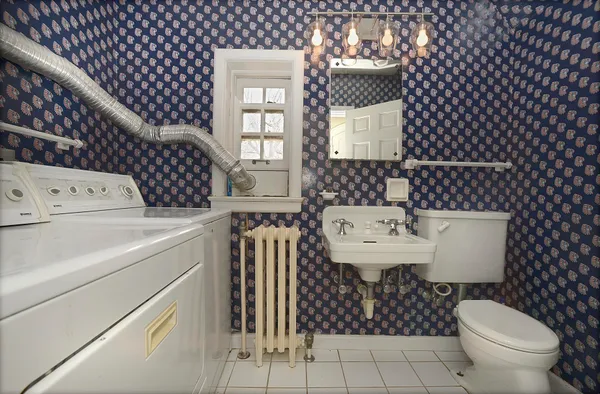 a bedroom with a bed and cabinets