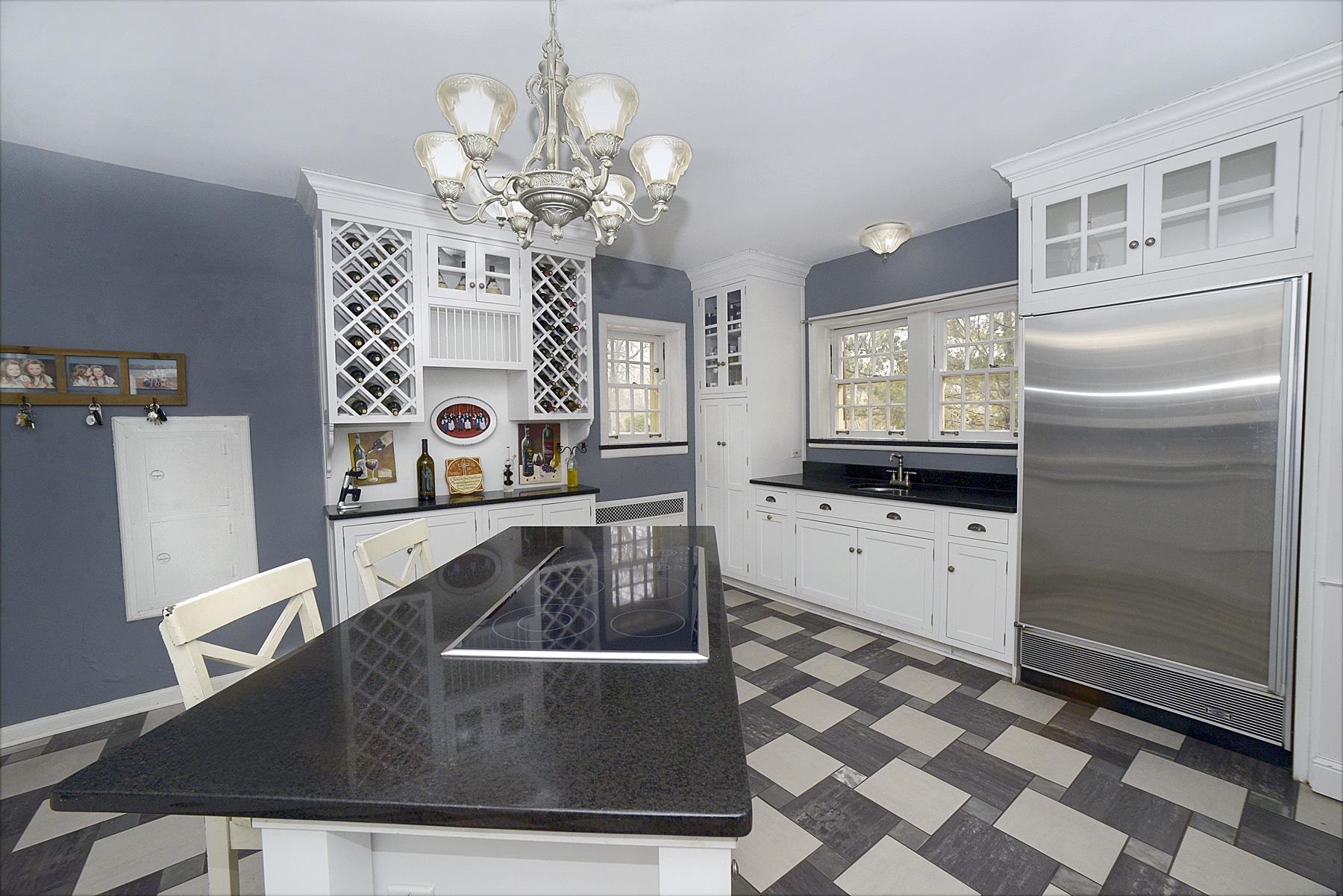 2221 Twin Oak Road Peru, IL 61354 - Photo 4 of 63 a kitchen with stainless steel appliances granite countertop a sink and a refrigerator