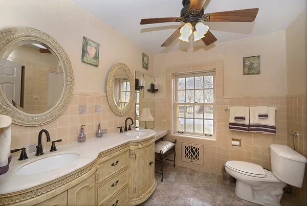 a room that has a bed and a table in it