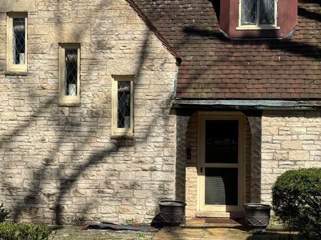 2221 Twin Oak Road Peru, IL 61354 - Photo 60 of 63 a brick house with a street