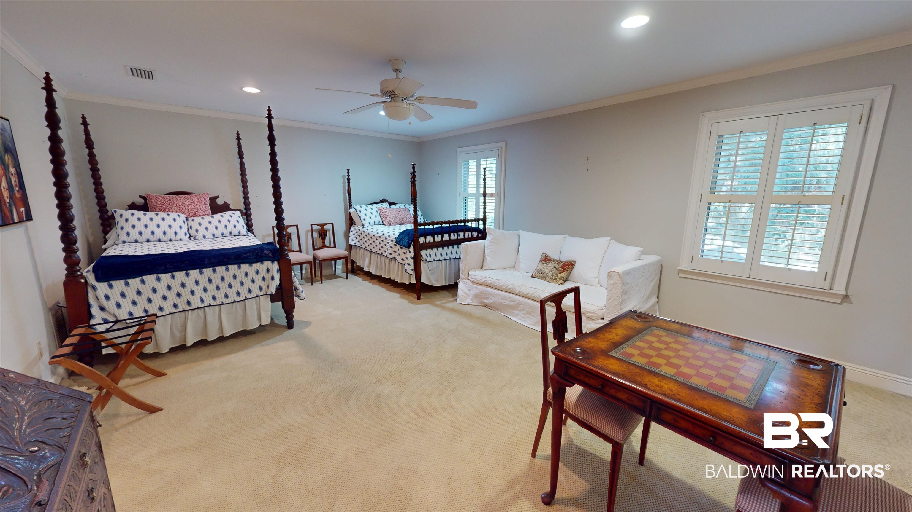 2404 Spring Hill Avenue, Unit 115 Mobile, AL 36607 - Photo 24 of 38 Carpeted bedroom featuring ceiling fan and ornamental molding