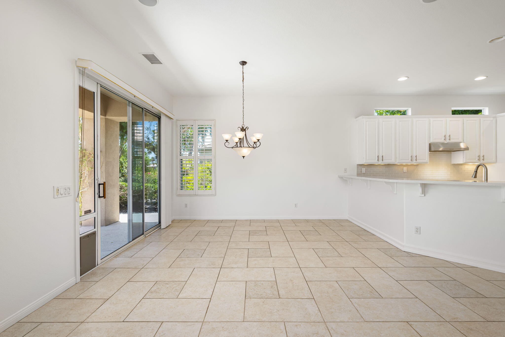 44528 Knightswood Road Indio, CA 92201 - Photo 14 of 46 a view of a kitchen with a sink and a window