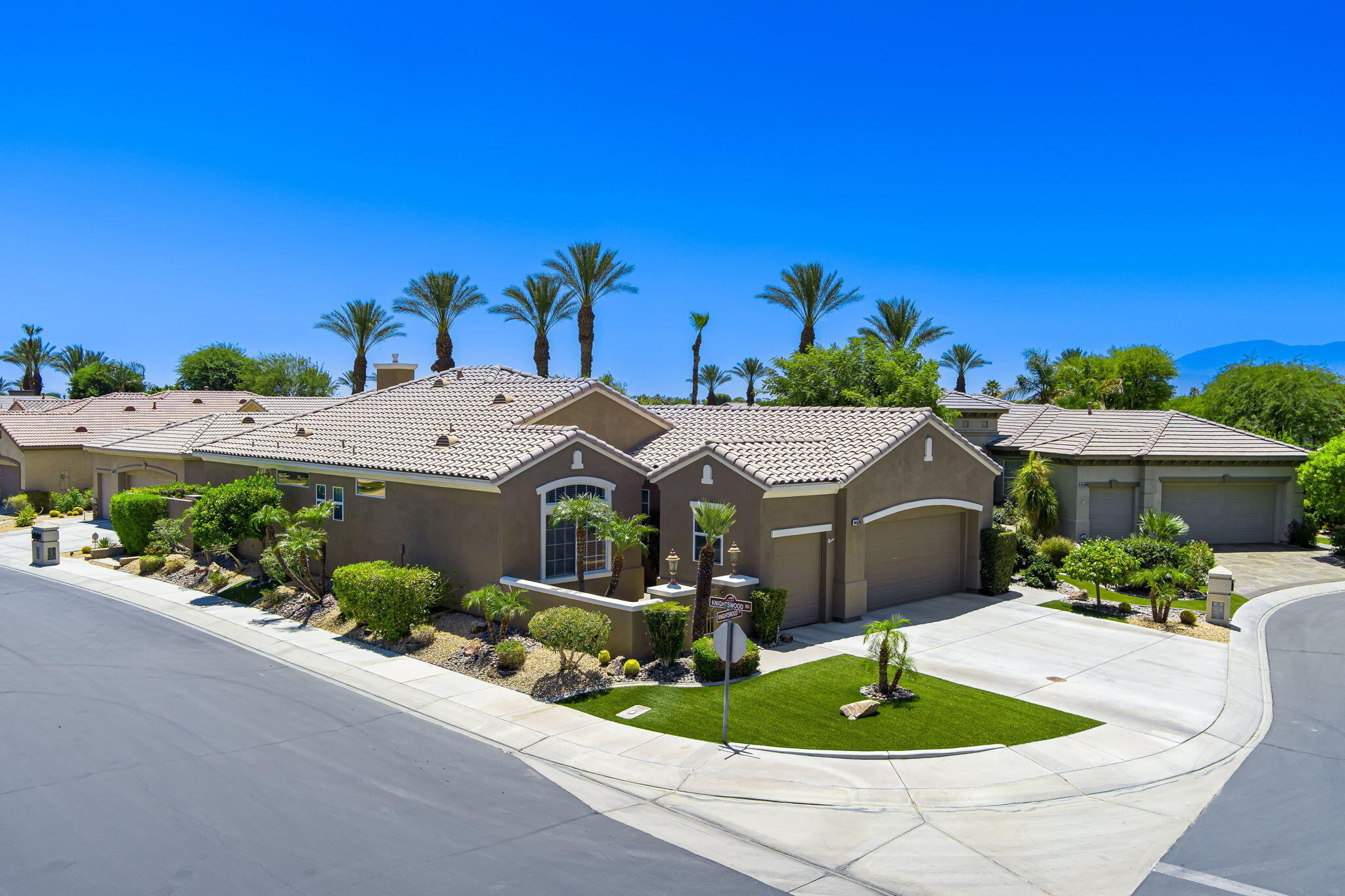 44528 Knightswood Road Indio, CA 92201 - Photo 3 of 46 a front view of a house with a yard
