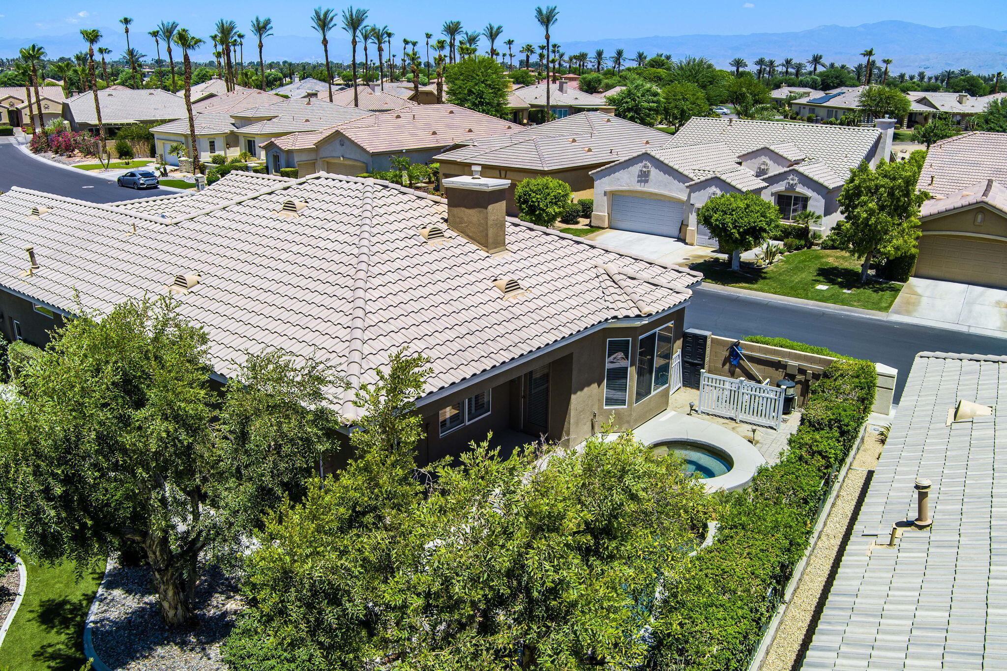 44528 Knightswood Road Indio, CA 92201 - Photo 40 of 46 an aerial view of a house with garden space and sitting area