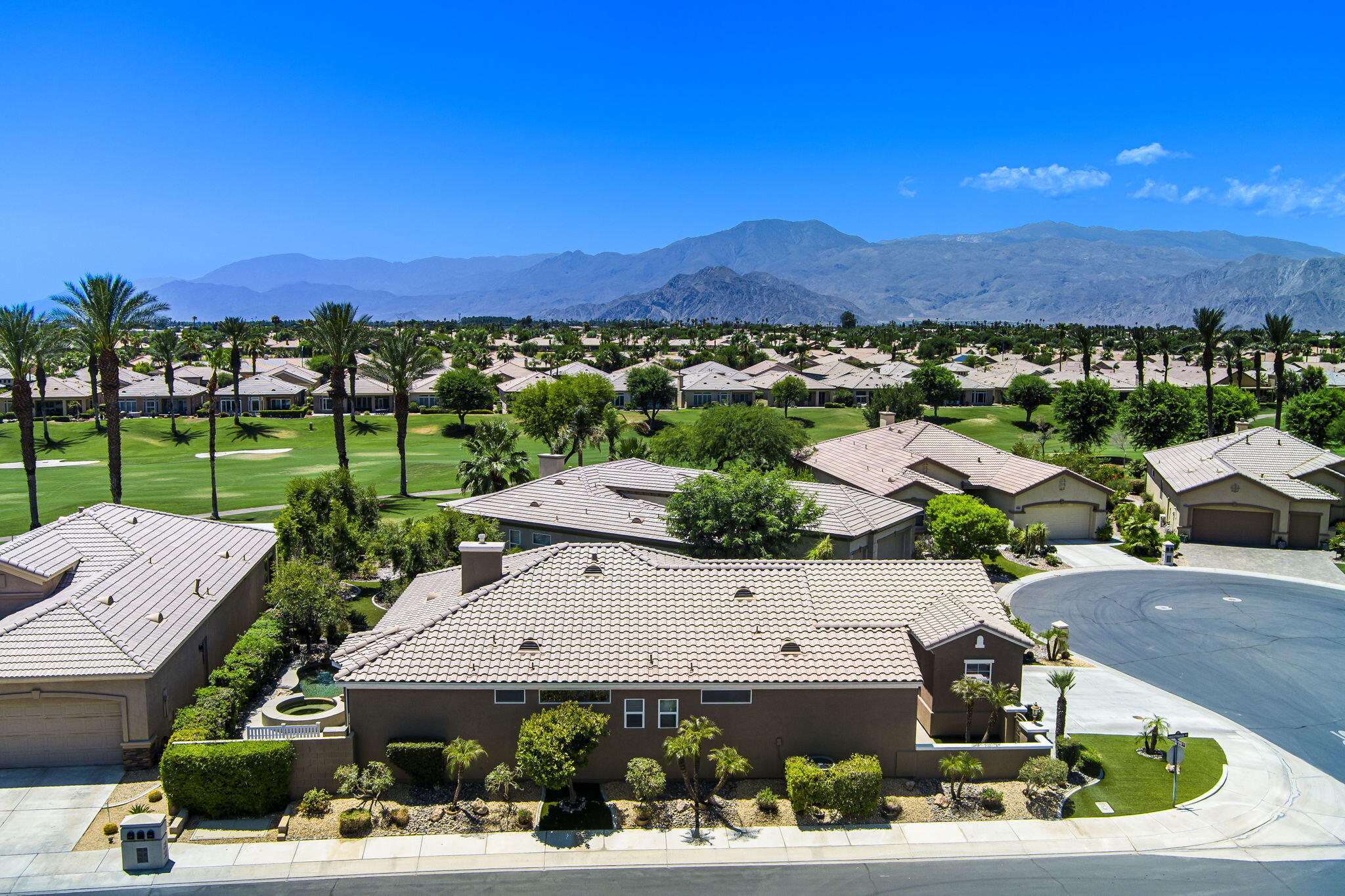 44528 Knightswood Road Indio, CA 92201 - Photo 4 of 46 an aerial view of a house with a garden