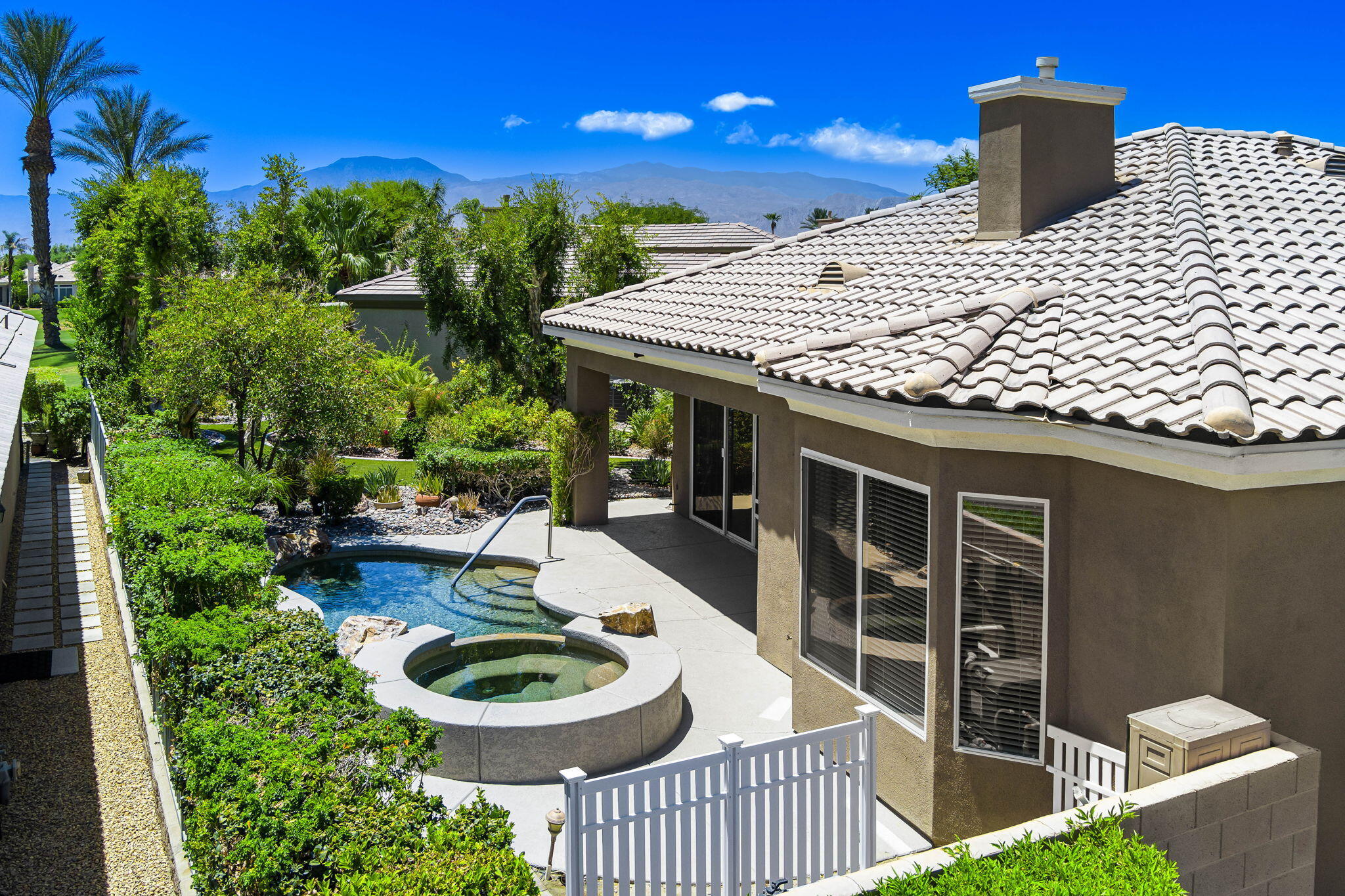 44528 Knightswood Road Indio, CA 92201 - Photo 42 of 46 a patio with table and chairs