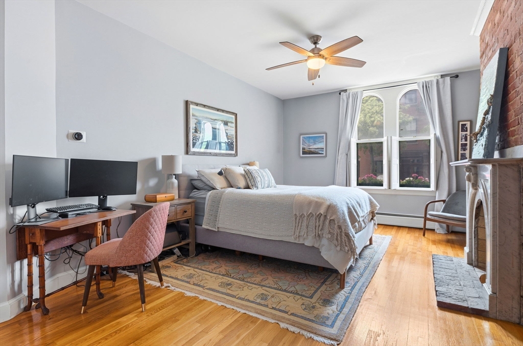 35 High Street, Unit 1 Boston, MA 02129 - Photo 5 of 33 a bedroom with a bed and a desk