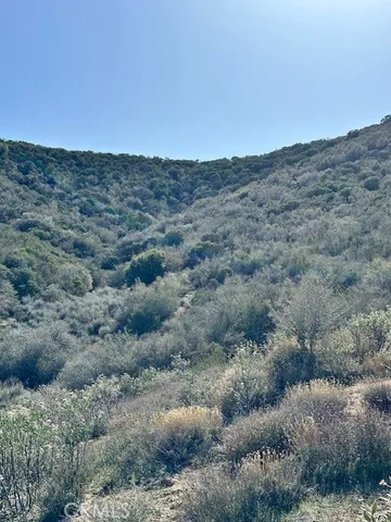 a view of mountains and valleys