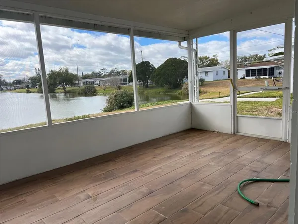 a view of a room with a large window