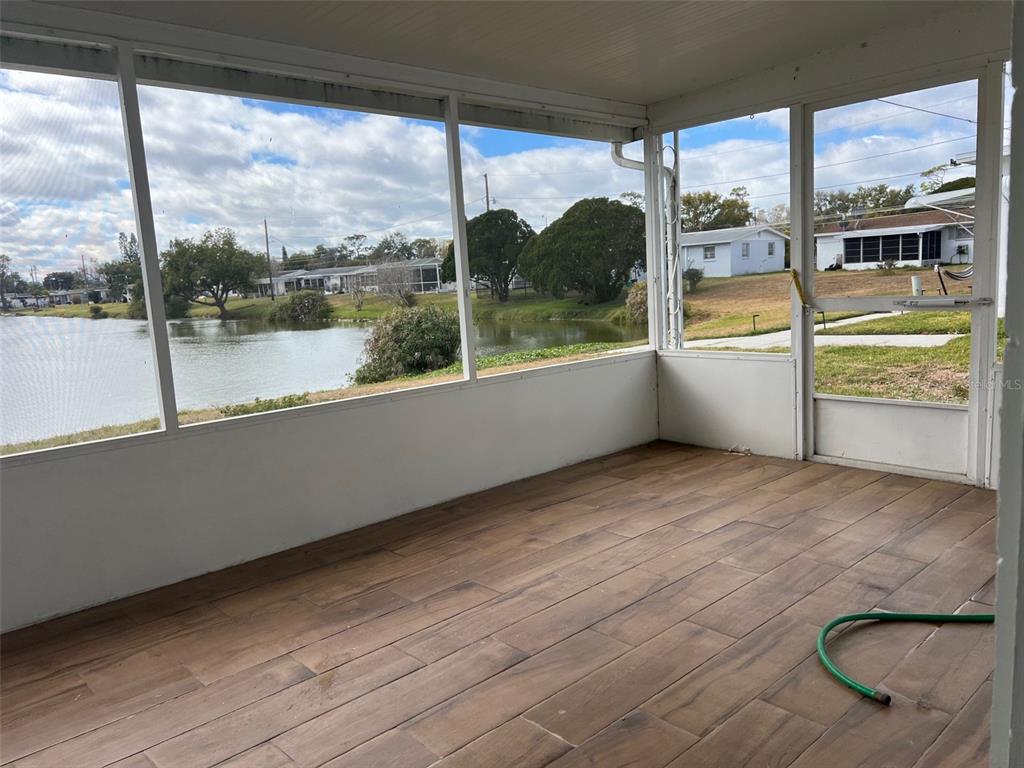 5046 Victoria Lane Holiday, FL 34690 - Photo 2 of 24 a view of a room with a large window
