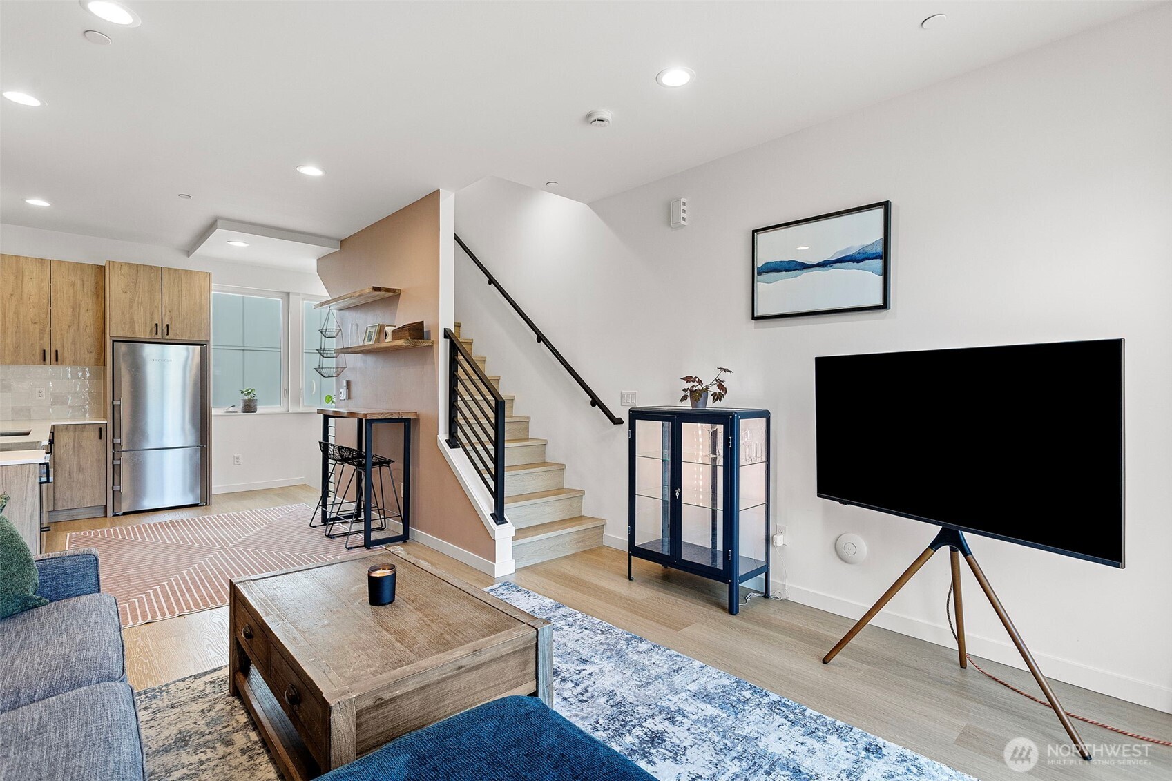 8455 Delridge Way Southwest Seattle, WA 98106 - Photo 12 of 20 a living room with furniture and a flat screen tv