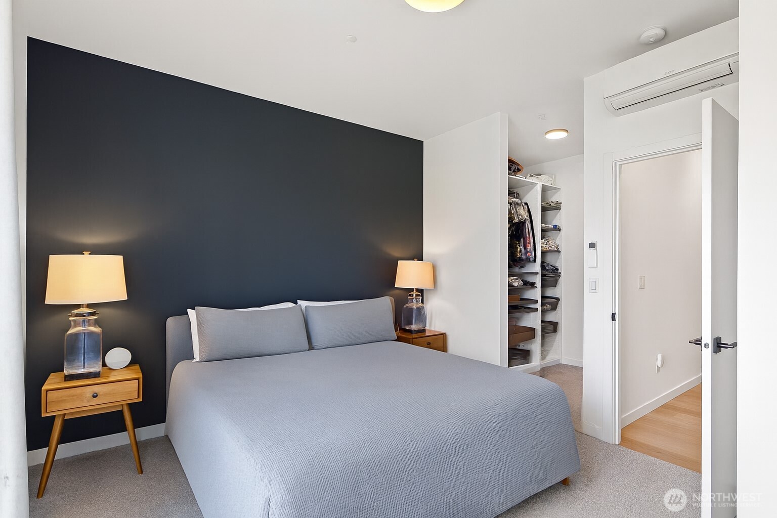 8455 Delridge Way Southwest Seattle, WA 98106 - Photo 14 of 20 a bedroom with a bed and a window