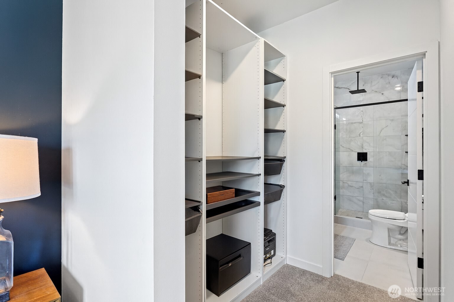 8455 Delridge Way Southwest Seattle, WA 98106 - Photo 15 of 20 a walk in closet and a bathroom view
