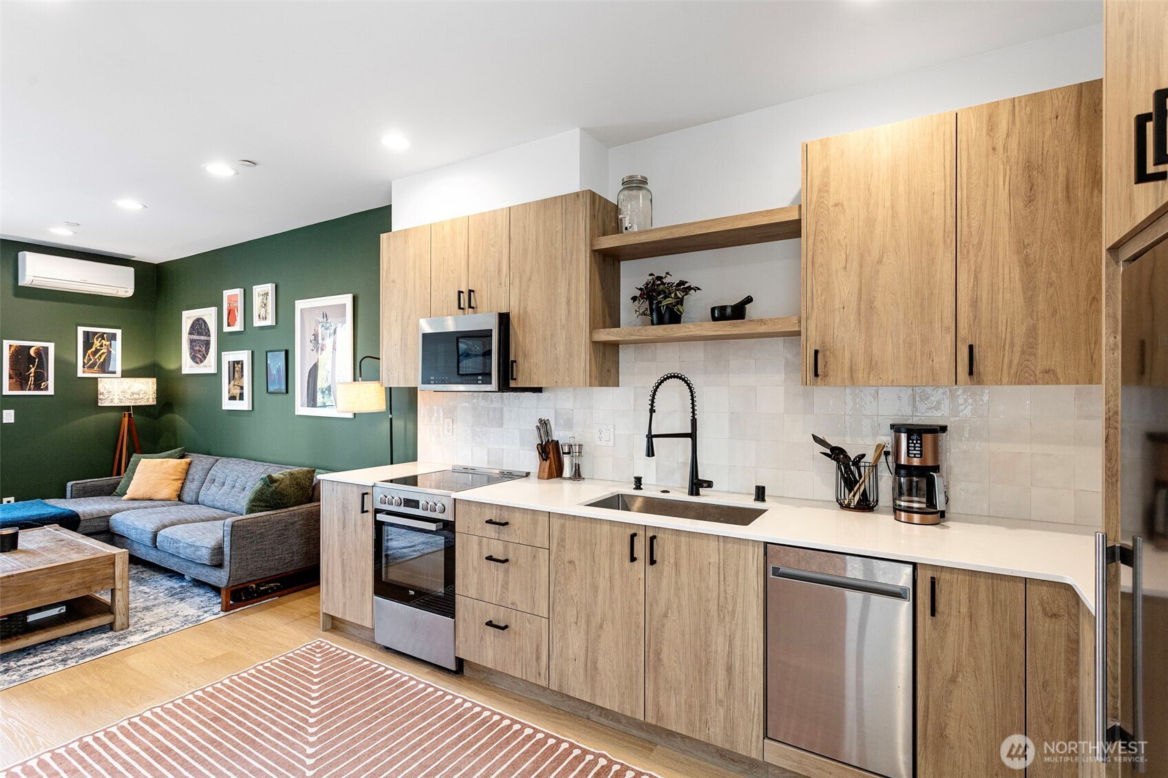 8455 Delridge Way Southwest Seattle, WA 98106 - Photo 8 of 20 a kitchen with a sink cabinets and window