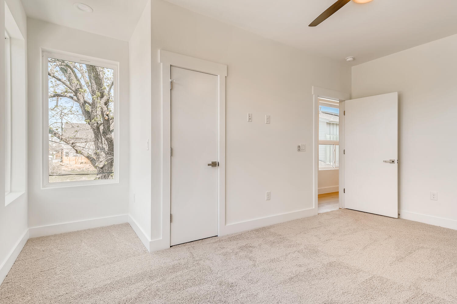 505 Kemp Street Austin, TX 78741 - Photo 20 of 34 The first of the secondary bedrooms has great natural light and a walk-in closet.