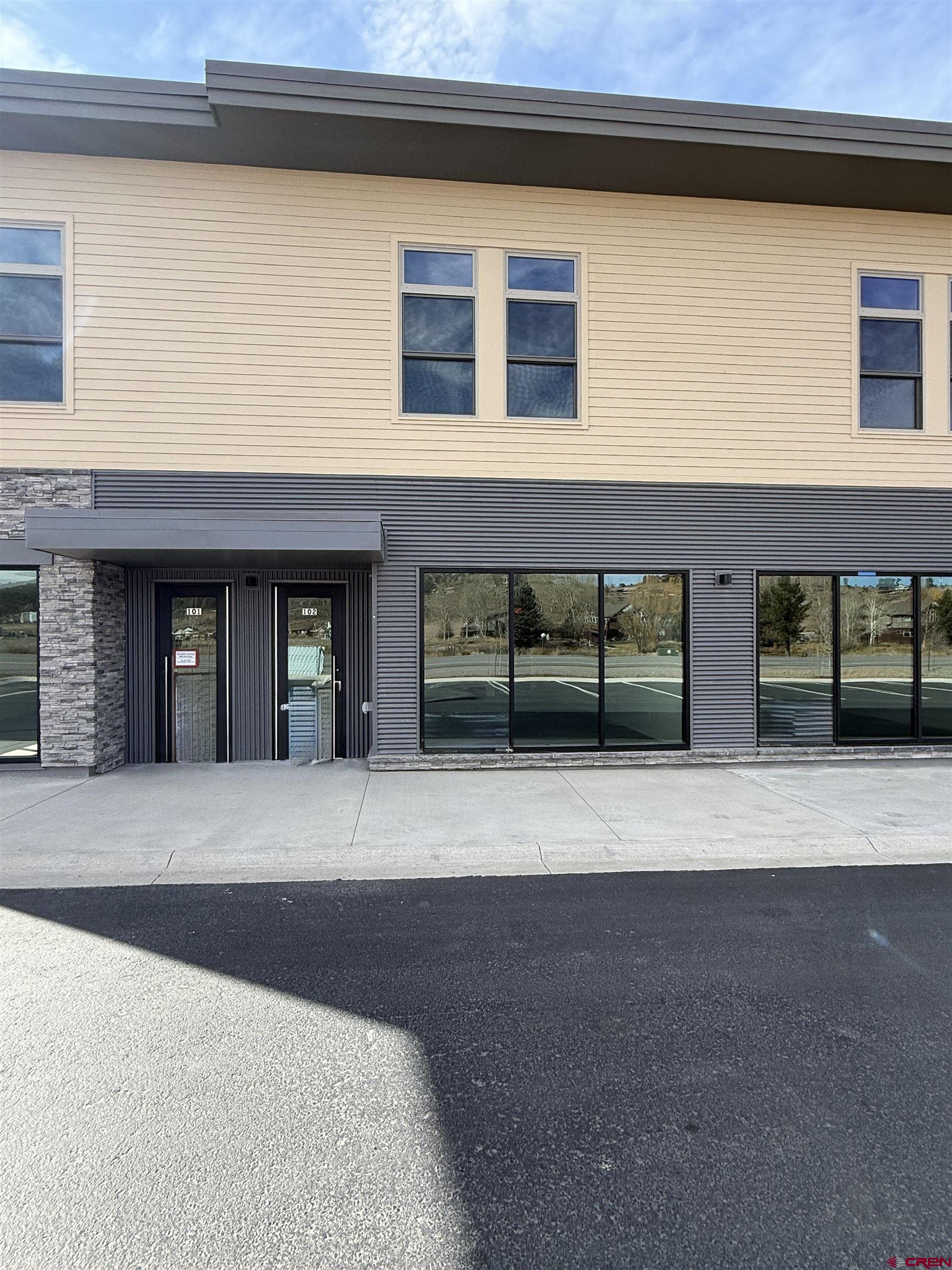 205 Jasper Lane, Unit 102 Ridgway, CO 81432 - Photo 1 of 29 a front view of building with street