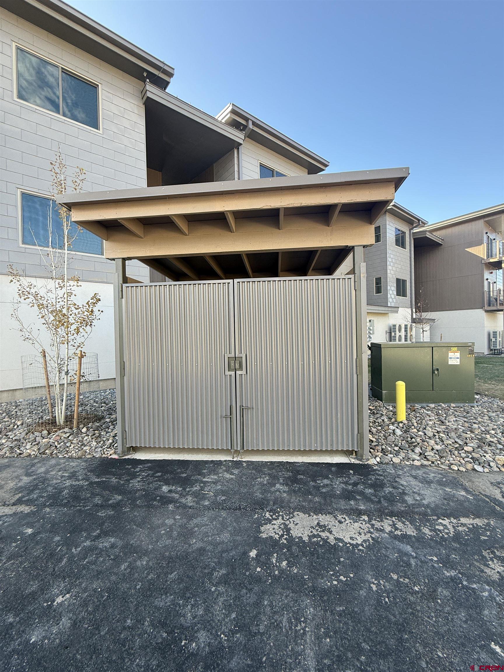 205 Jasper Lane, Unit 102 Ridgway, CO 81432 - Photo 22 of 29 a view of a house with a outdoor space