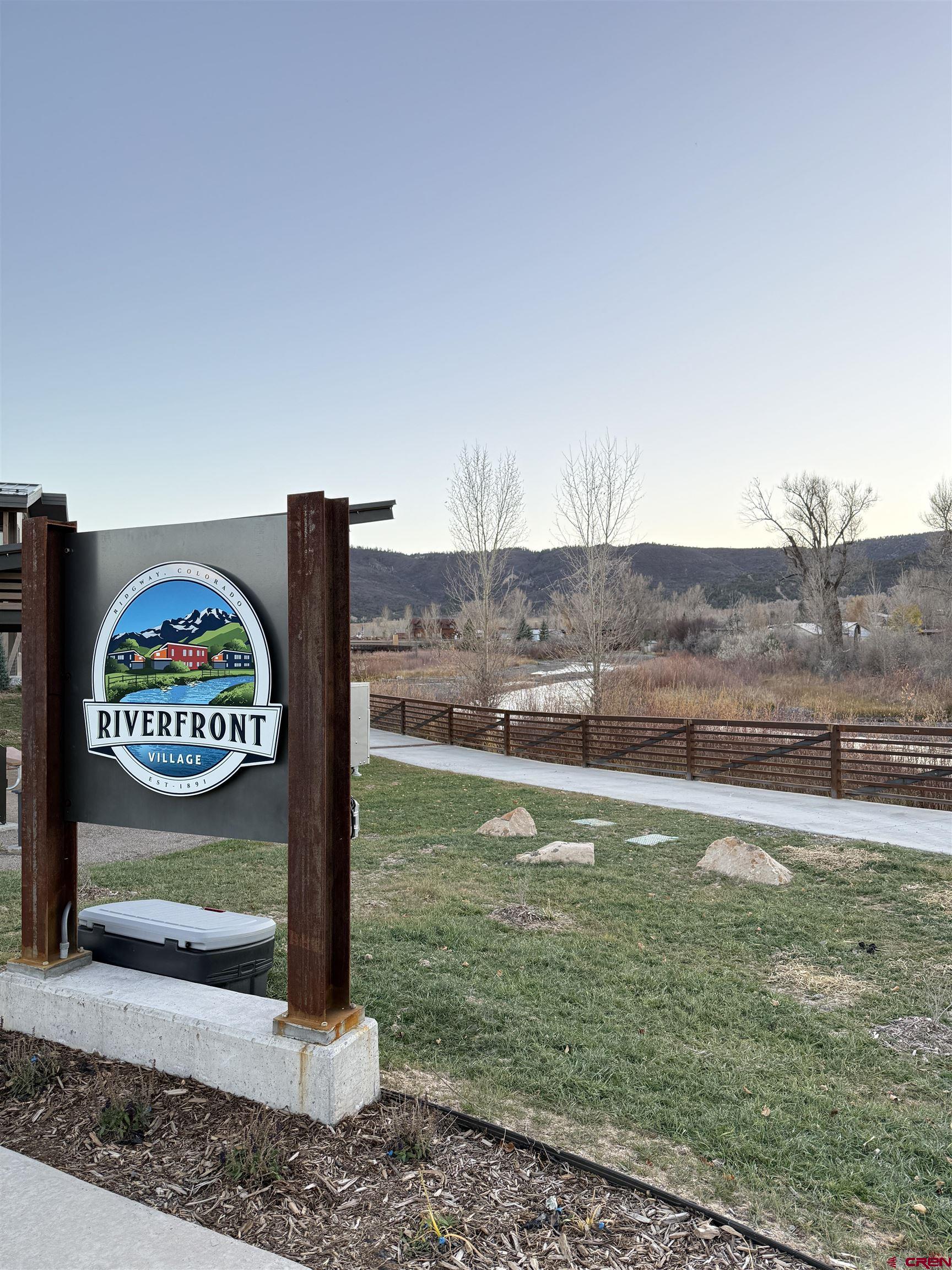 205 Jasper Lane, Unit 102 Ridgway, CO 81432 - Photo 26 of 29 a view of a street with a park