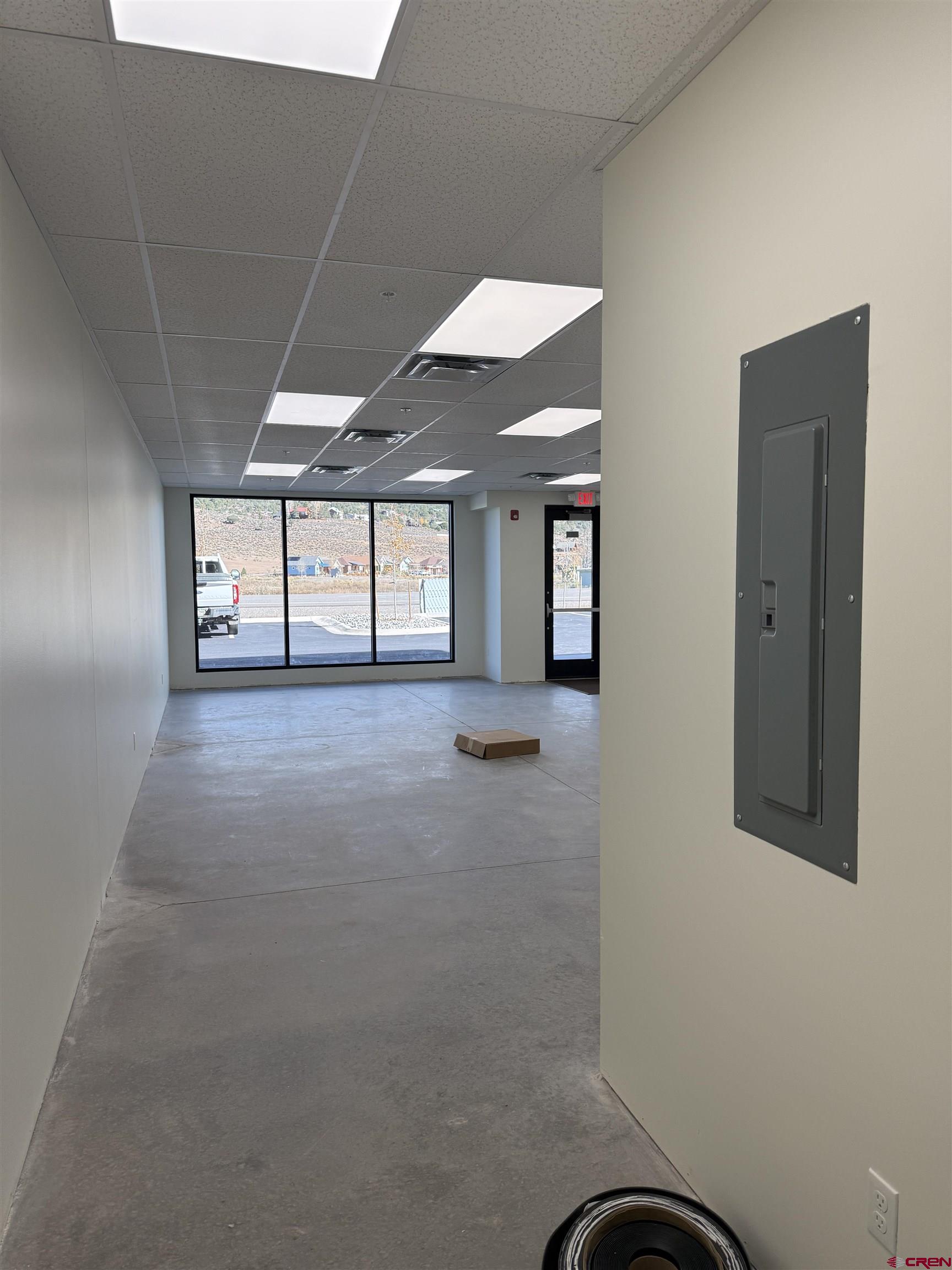 205 Jasper Lane, Unit 102 Ridgway, CO 81432 - Photo 6 of 29 a view of a livingroom with a staircase