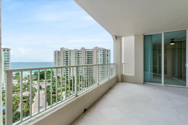 a view of a balcony with city view