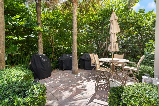a view of balcony with furniture