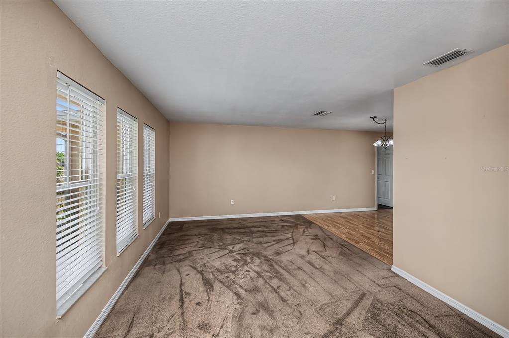 443 Fairmont Terrace Port Charlotte, FL 33954 - Photo 16 of 77 a view of an empty room with a window