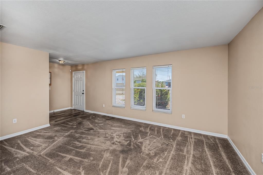 443 Fairmont Terrace Port Charlotte, FL 33954 - Photo 18 of 77 a view of an empty room with a window