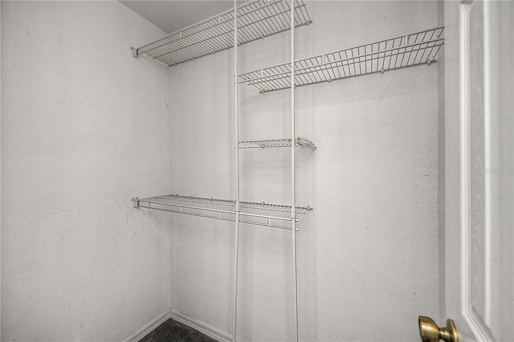 443 Fairmont Terrace Port Charlotte, FL 33954 - Photo 41 of 77 a view of a room with racks on the wall